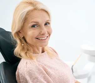 Woman smiling in the dental chair