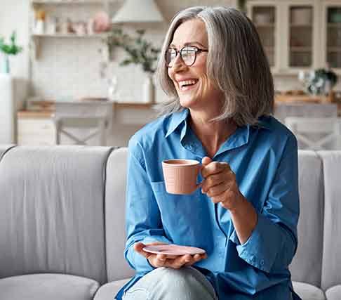  Older patient in Marysville with dental implants relaxing